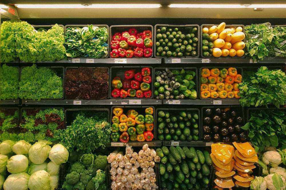 Supermarket produce aisle — LS Central grocery tenant on Novacare